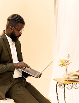Agent reviewing renter requirements on a laptop